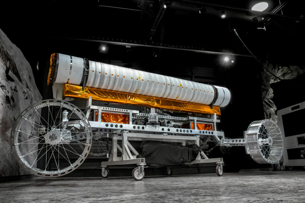 Astrobotic's VSAT Analog model posed in the Moonshot museum